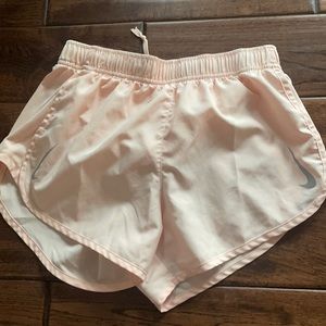 Women’s small peach Nike running shorts